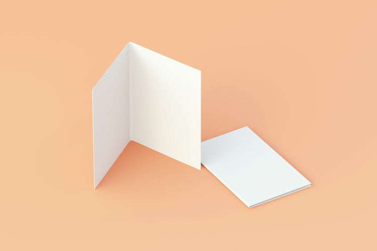 blank white cards on orange background